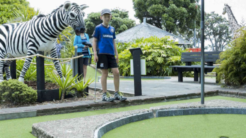 Walk among the dinosaurs and journey through the Serengti plains of Africa with Auckland’s first themed 18 hole mini-golf experience!